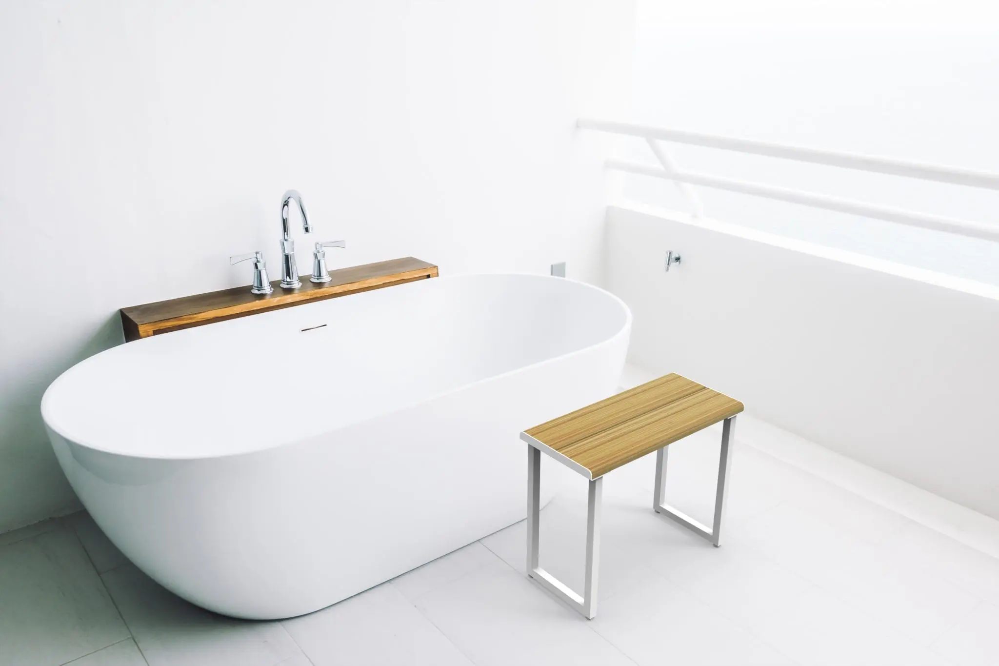 Invisia Shower Bench beside a beautiful freestanding bathtub