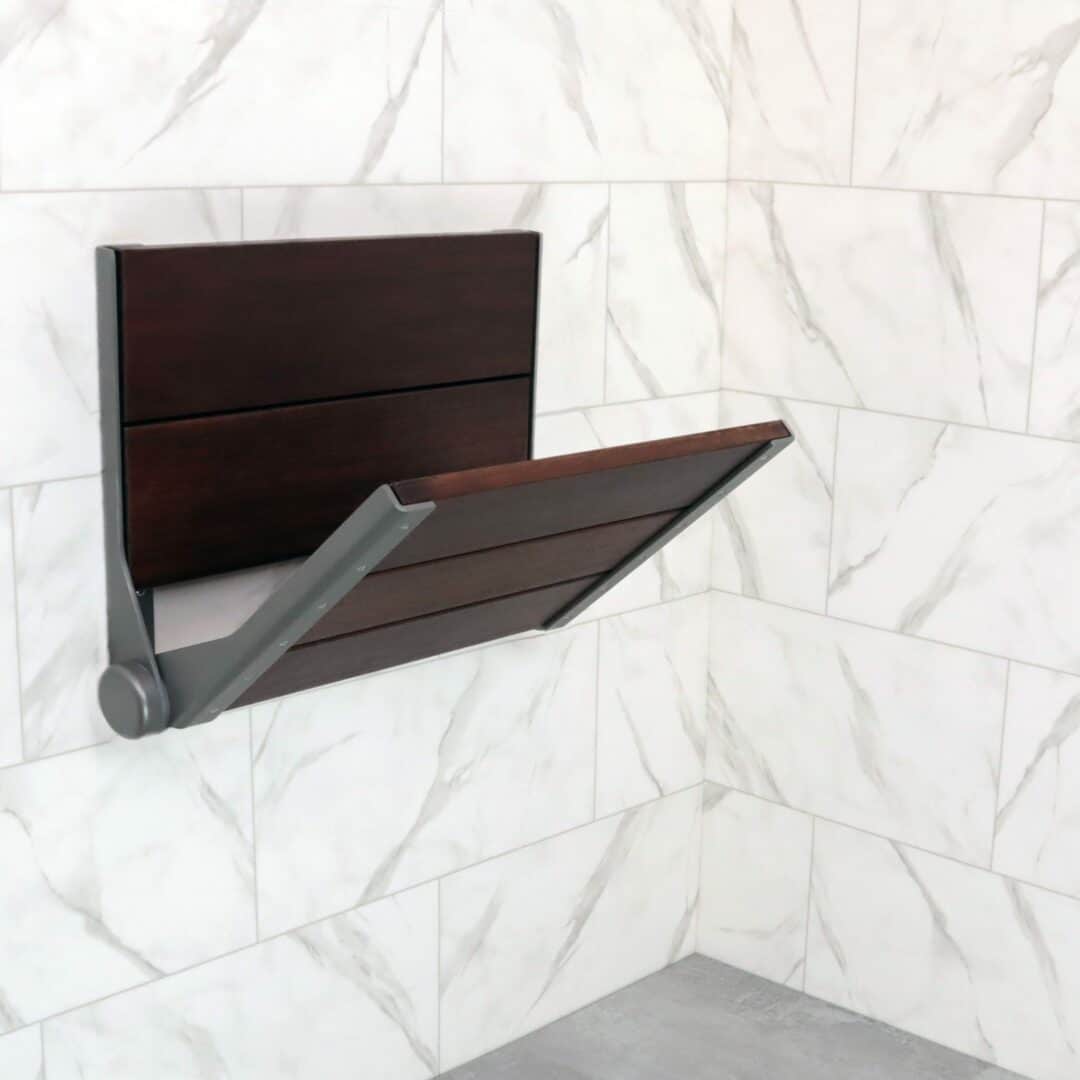 Image of the SerenaSeat installed in a bathroom, and the seat is holding it's position at a 45 degree angle