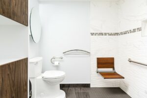 Photo of an attractive, accessible bathroom by BuildAble—an Ottawa-based access remodeler—featuring products from Invisia Collection.