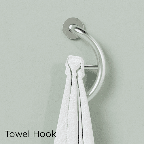 Towel hook grab bar with a white towel on a light green wall.