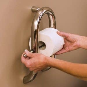 Showing how easy it is to change the toilet paper, in the Invisia Toilet Paper Holder